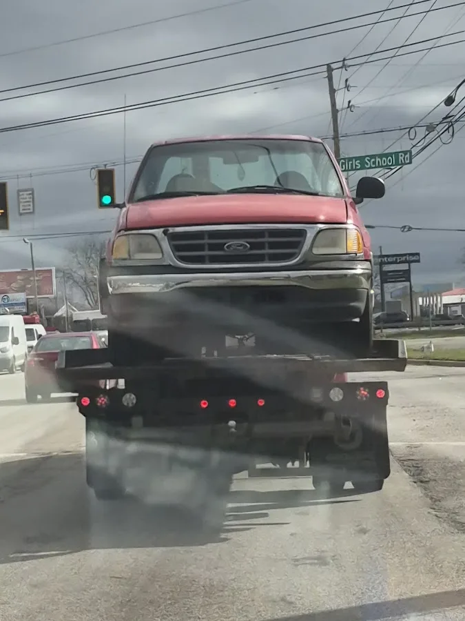 Hook"EM" Up TOWING & Roadside LLC