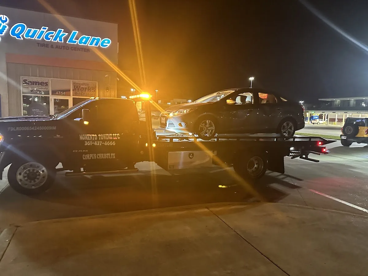 Momento Towing llc