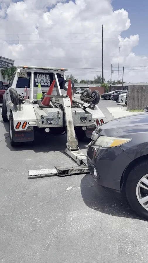 oint towing inc tow truck North Miami